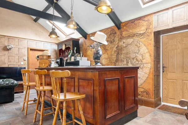 Chance to live in former TT course pub, bar included!